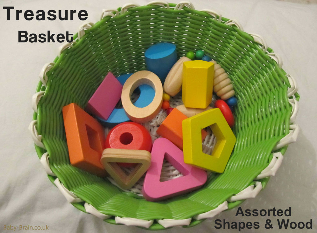 Assorted wooden shapes. treasure baskets and heuristic play: what, why & how. baby-brain.co.uk psychology resource perspective babies motherhood & blog